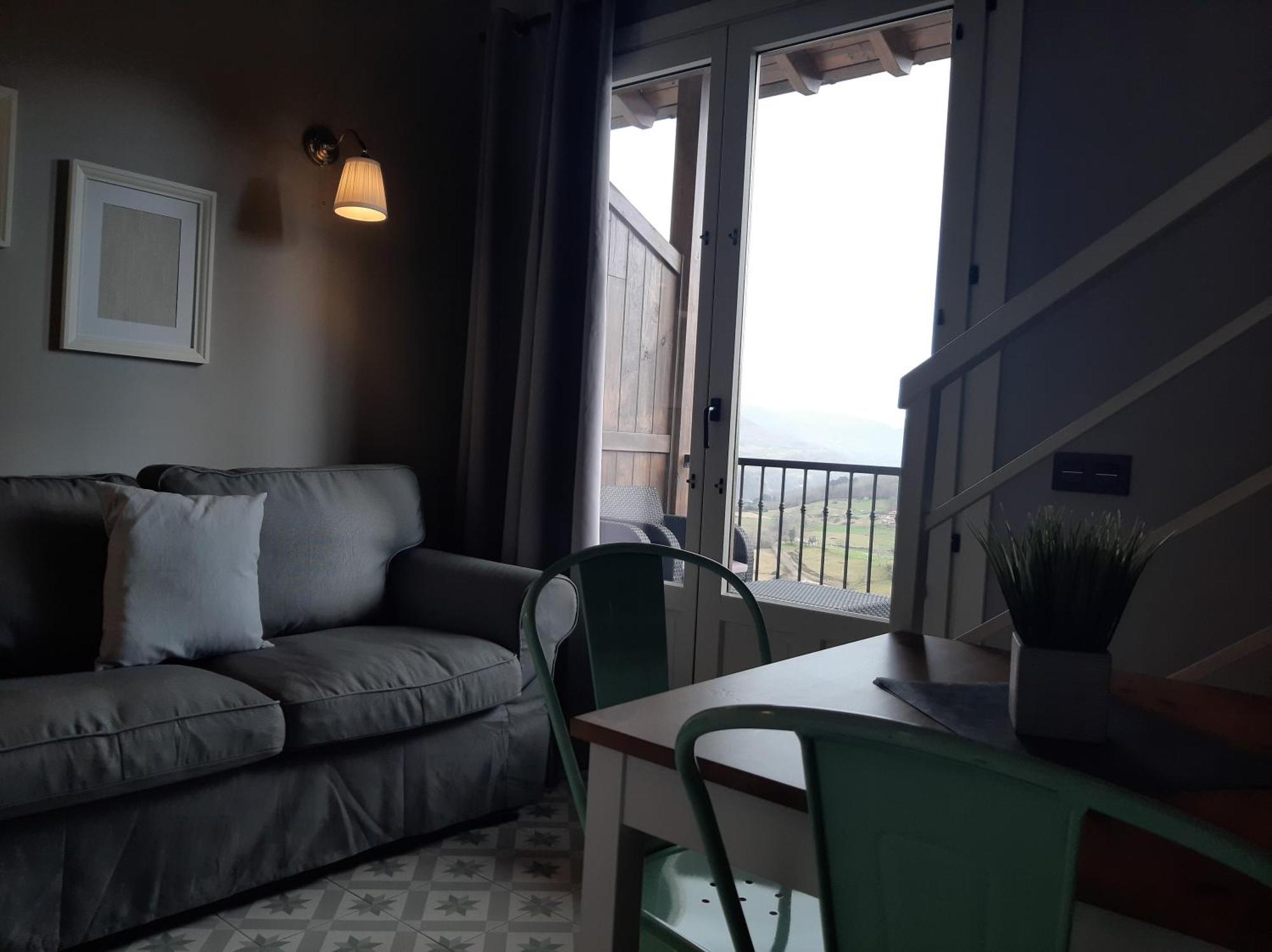 Apartamentos El Llanin Onís Rum bild