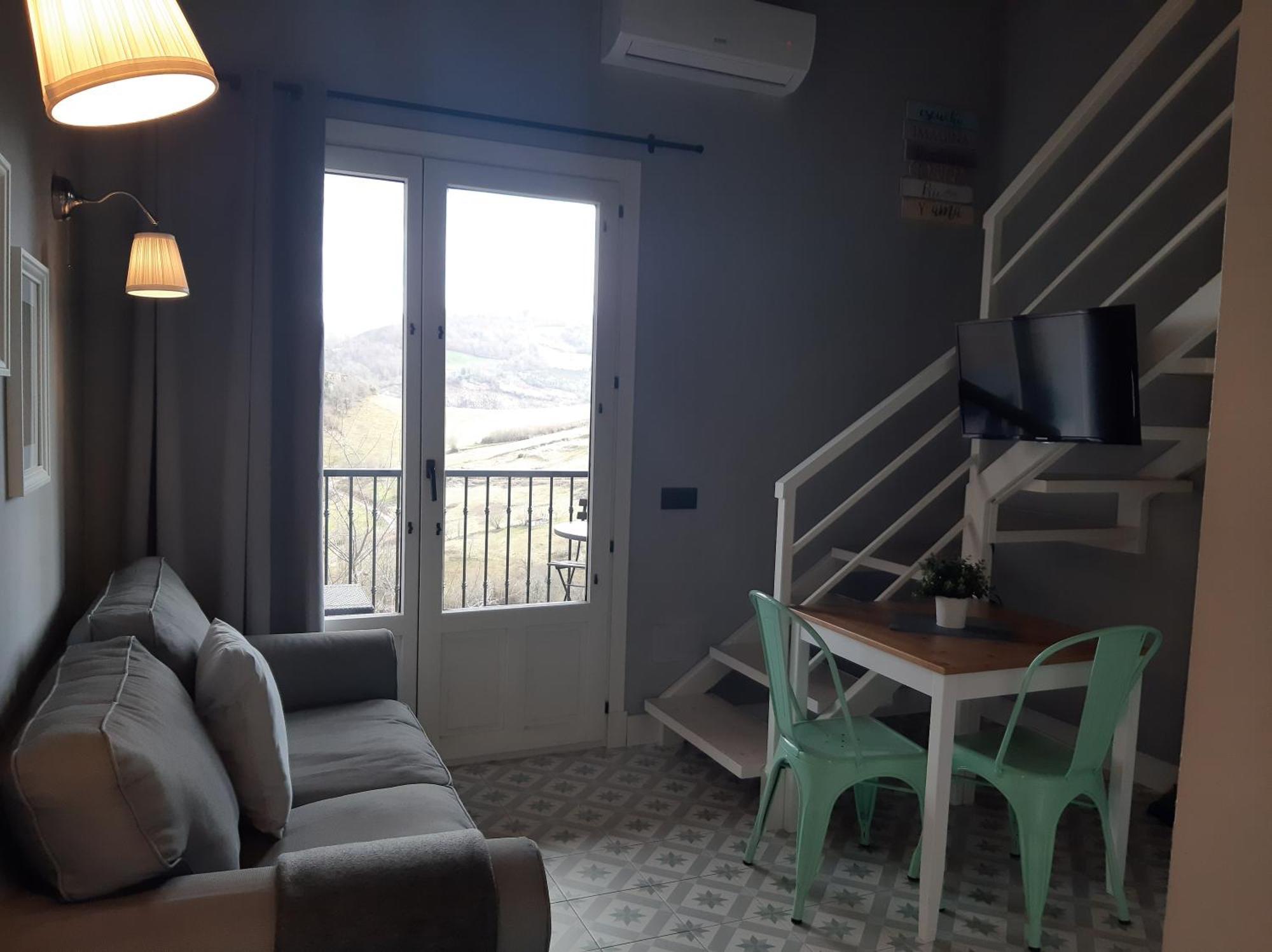 Apartamentos El Llanin Onís Rum bild