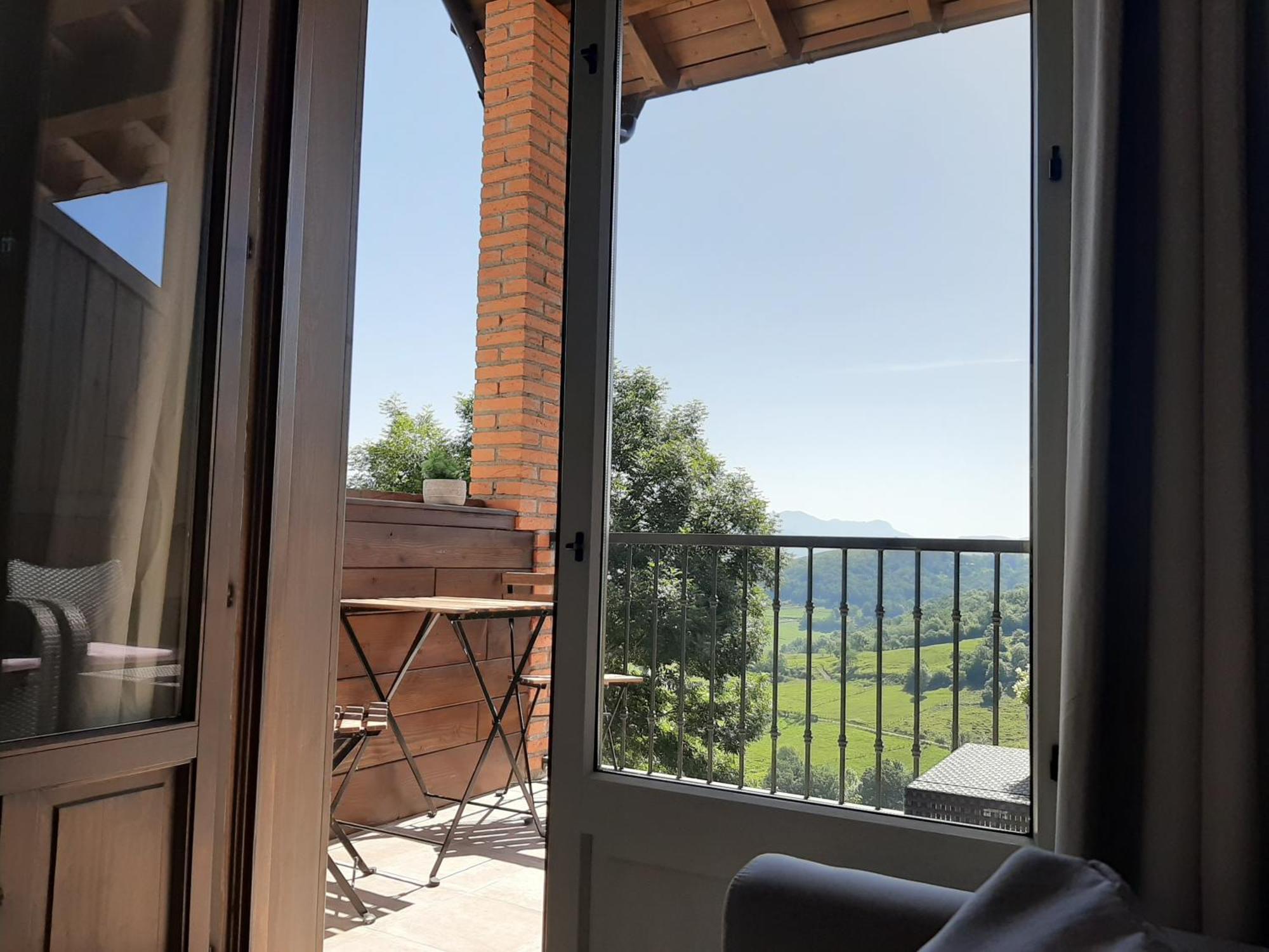 Apartamentos El Llanin Onís Rum bild