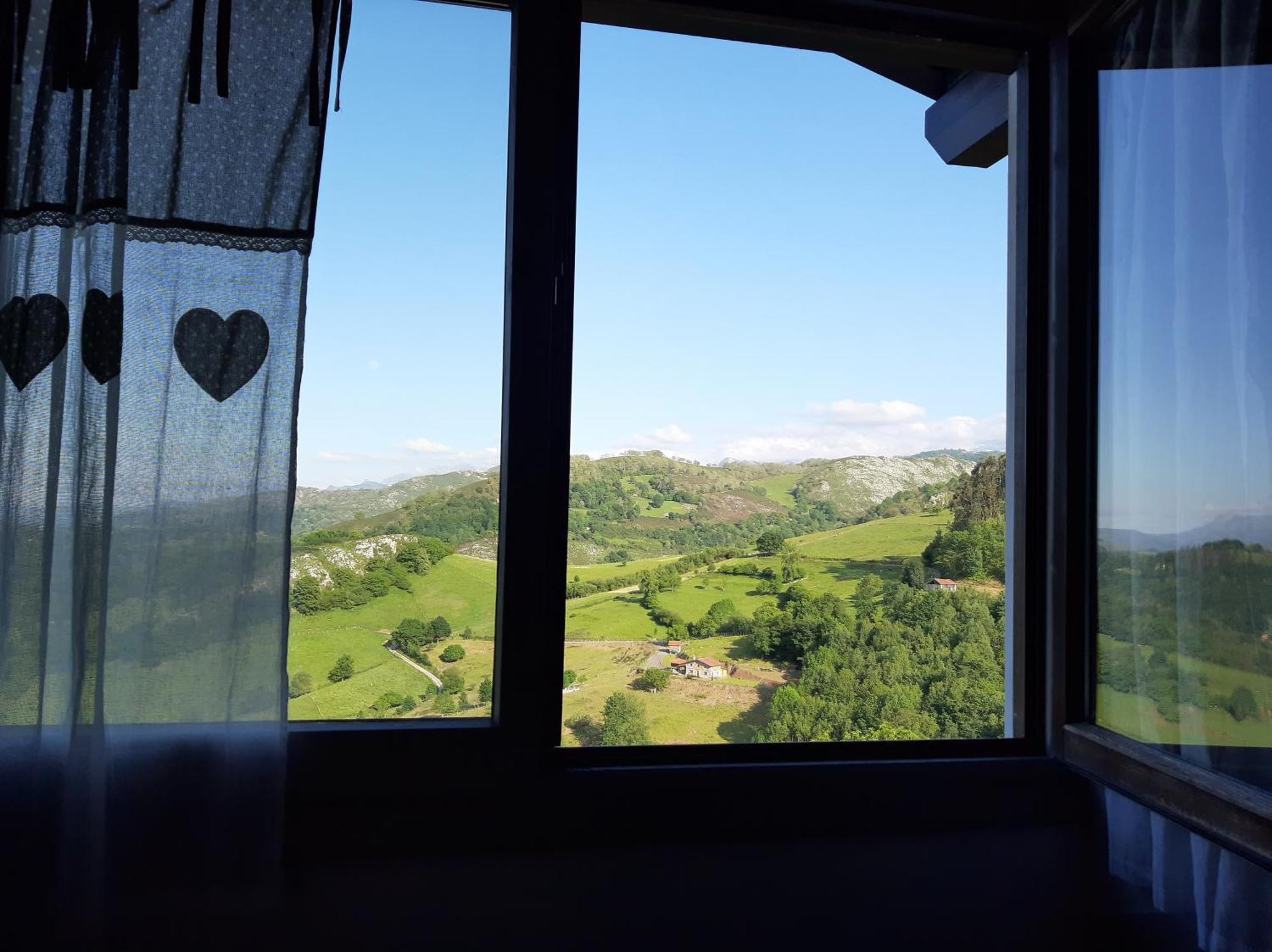 Apartamentos El Llanin Onís Rum bild